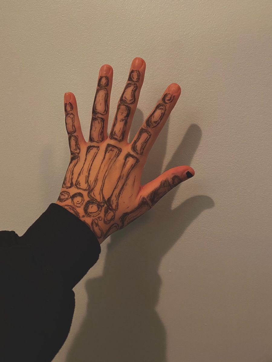 17 Skeleton Hand Tattoos: Ultimate Symbolism Guide